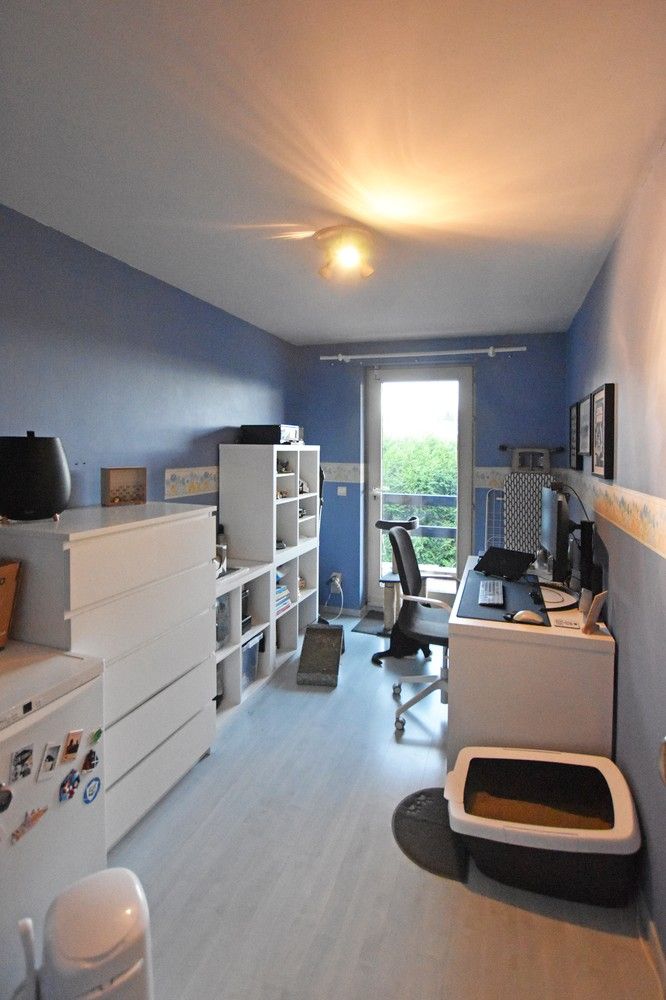 Verzorgd appartement met twee slaapkamers en terras te Wijnegem! foto 10