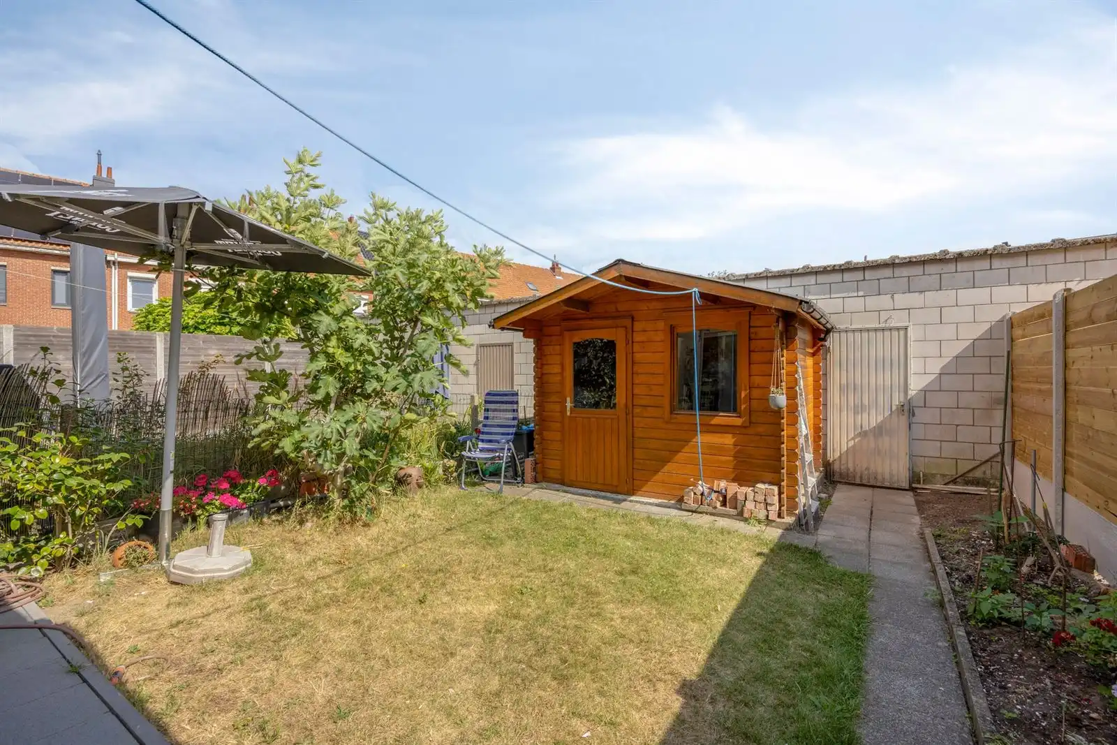 Volledig gerenoveerde 4-slpk woning met garagebox foto 26