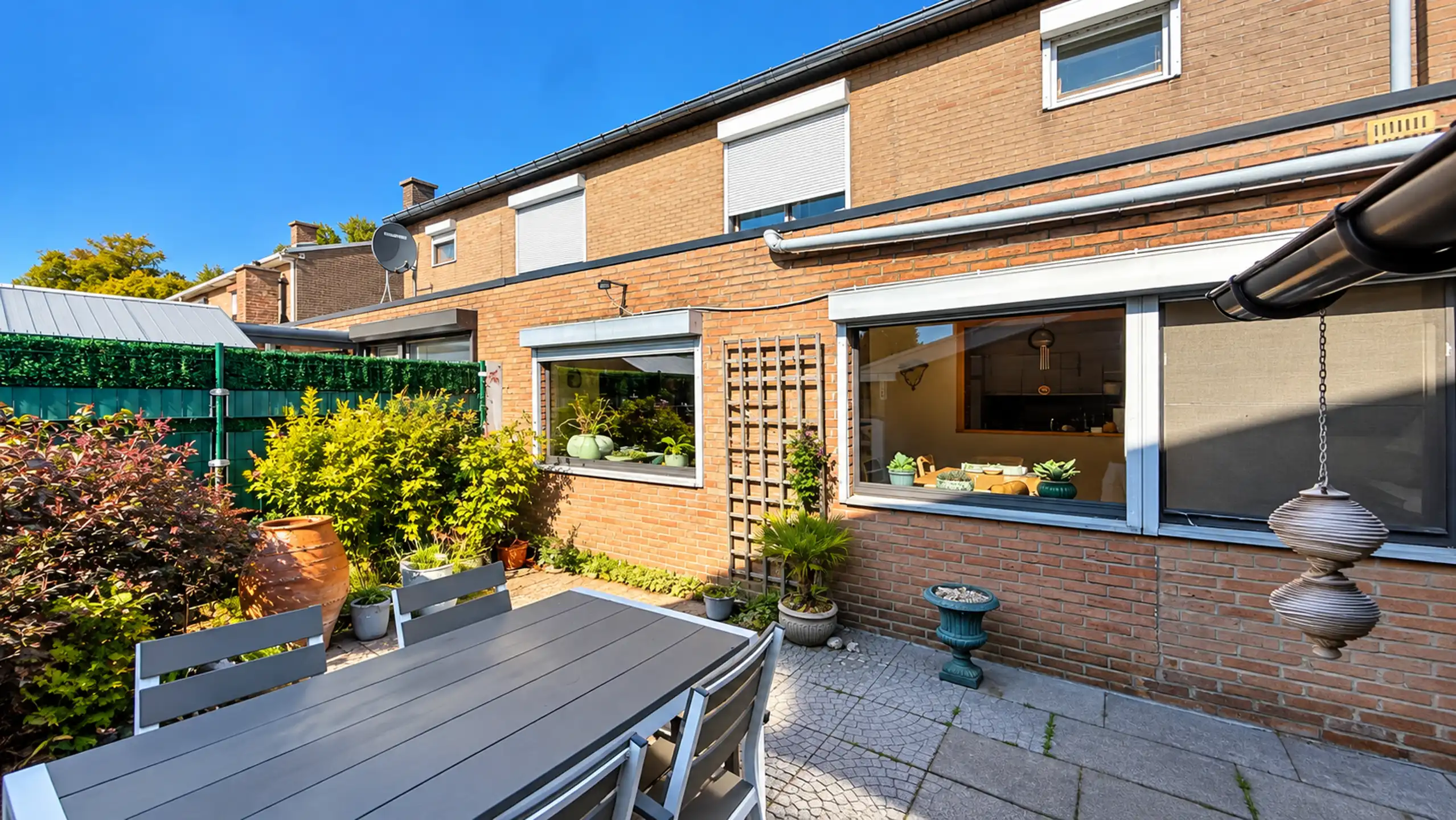 Goed onderhouden woning met 3slpk + garage in Heusden! foto 36