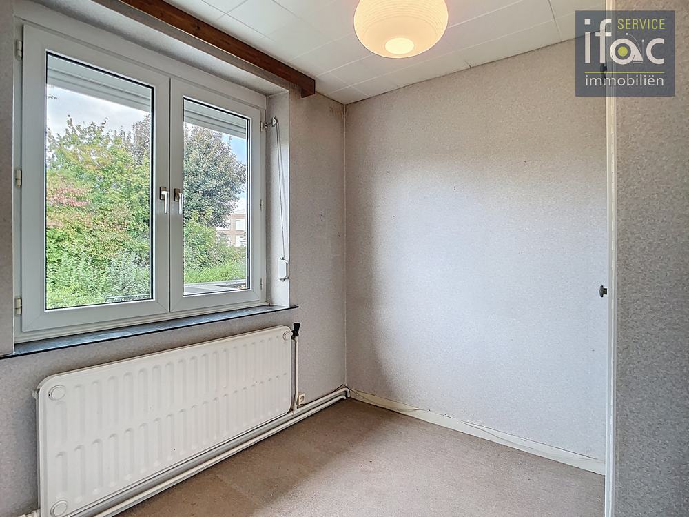 Rijhuis te koop foto 18