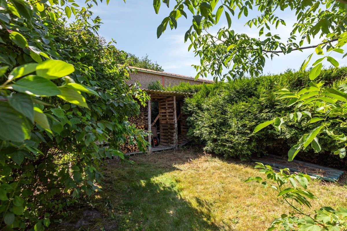 Rustig gelegen gelijkvloers woning met 2 slpks en ruime zolder. foto 21