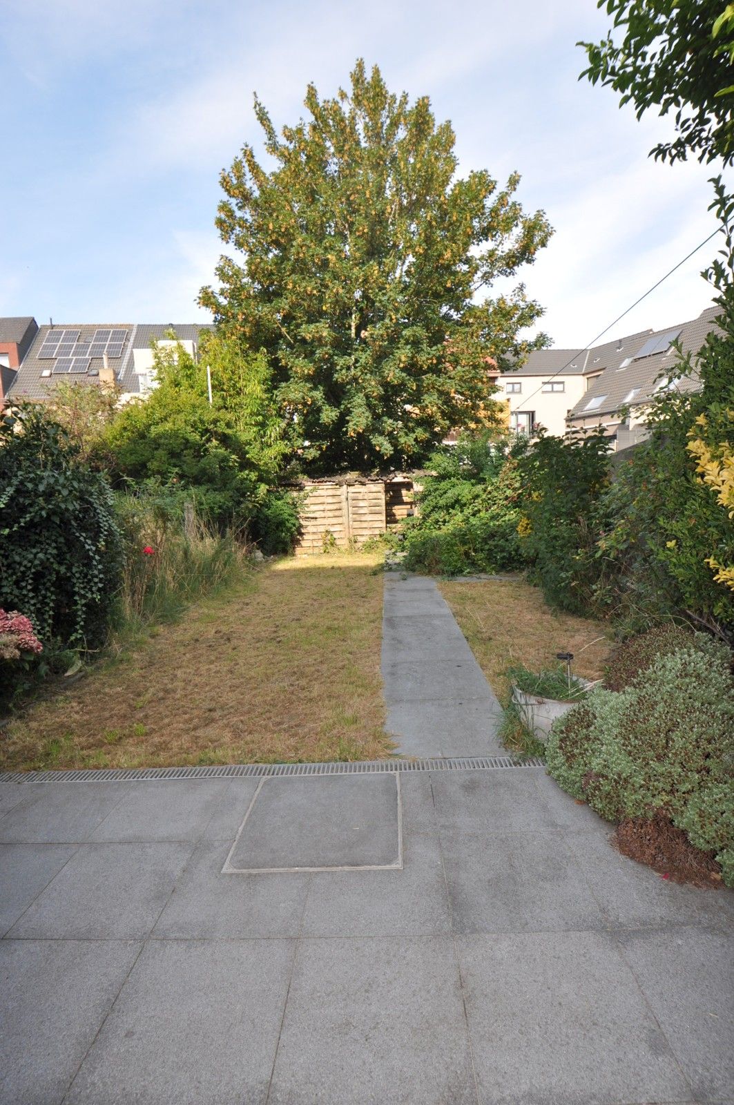 Ruime woning met veel potentieel en grote tuin ! foto 19