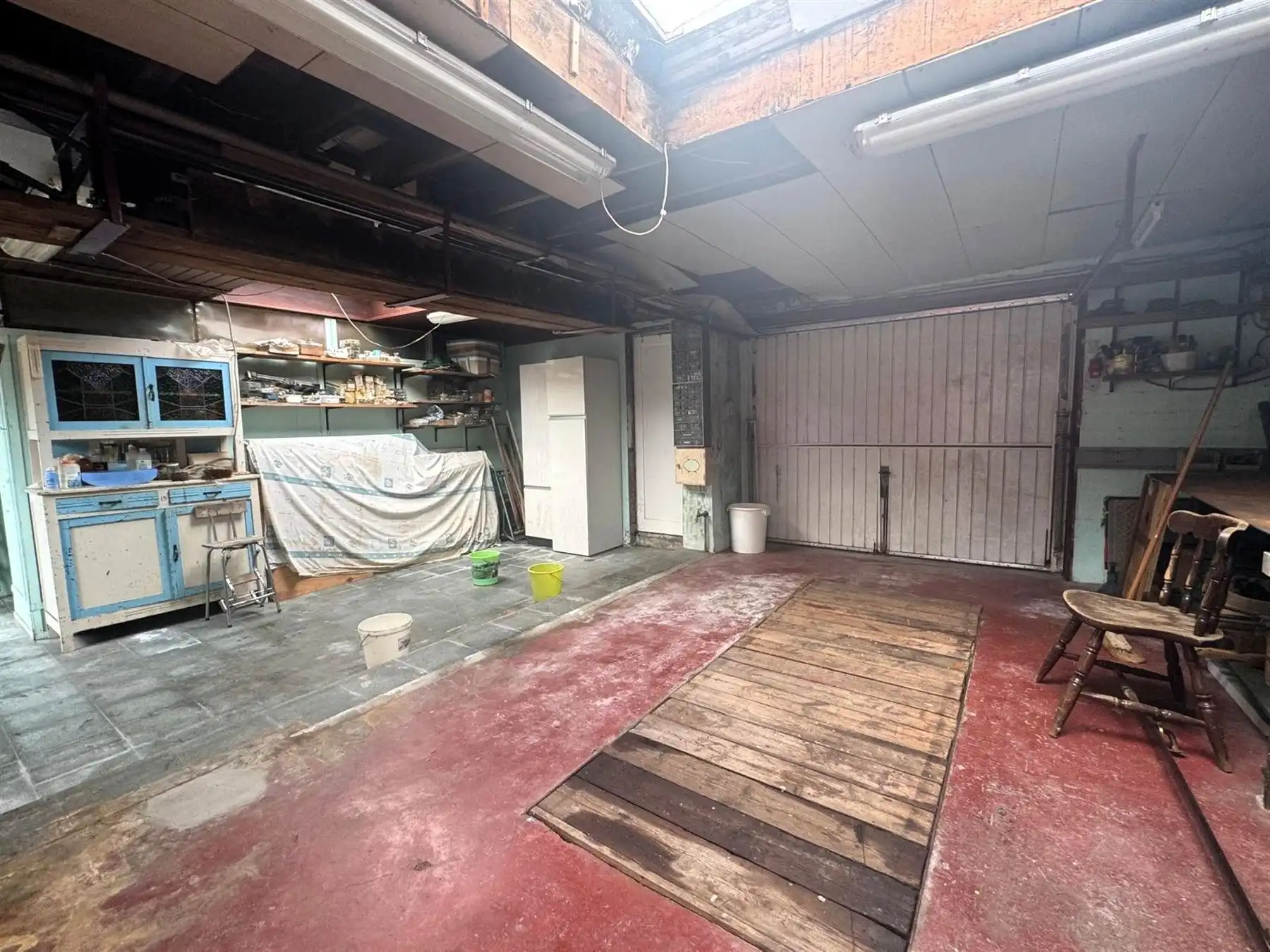 Ruime woning met drie slaapkamers en grote garage foto 12