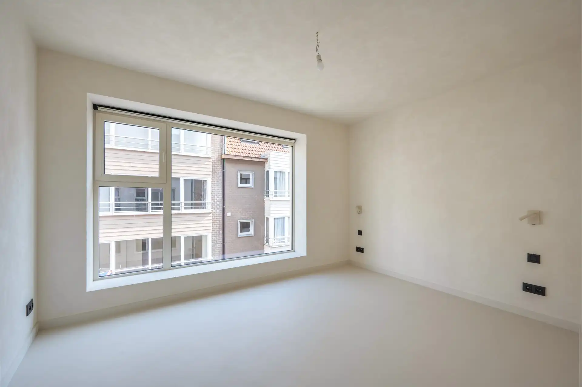 Volledig vernieuwde opbrengsteigendom met drie appartementen en verhuurd handelsgelijkvloers foto 18