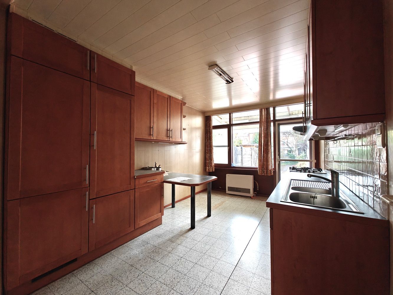 Te renoveren rijwoning met 3 slaapkamers en leuke tuin foto 8