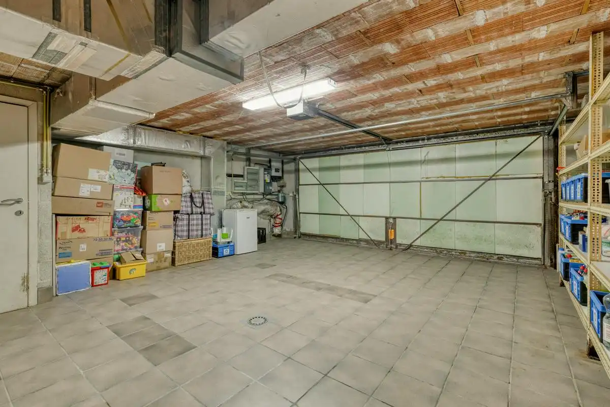 Uniek, lichtrijk huis te koop met speelse tussenniveaus  foto 34