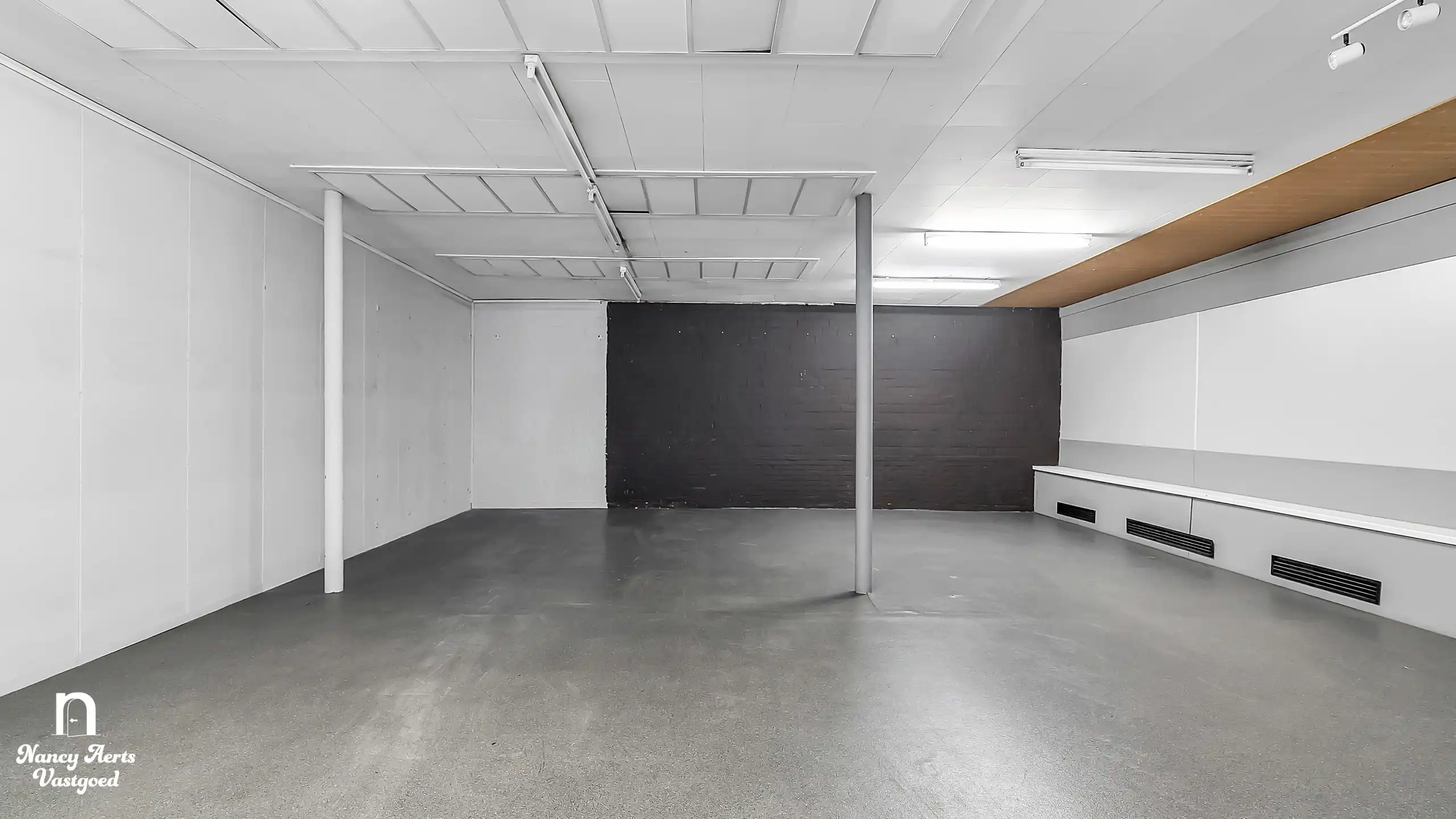 Handelspand van 395 m² in het centrum van Beringen foto 13