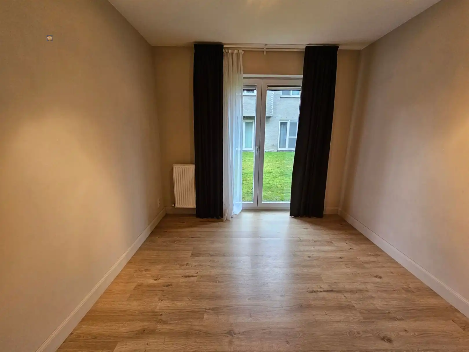 Gelijkvloers 2-slaapkamerappartement, terras en staanplaats foto 5