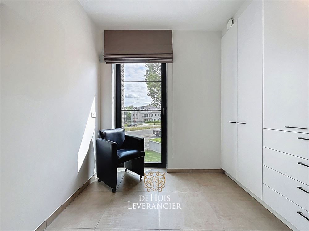 Discrete luxe & tijdloze elegantie : subliem nieuwbouwappartement met terras en gemeenschappelijk tuin te koop in Boechout foto 33