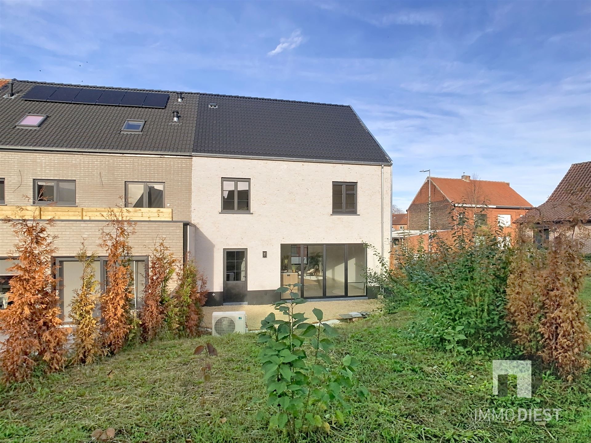 Charmante energiezuinige nieuwbouwwoning met zonnige tuin in hartje Zichem. foto 27