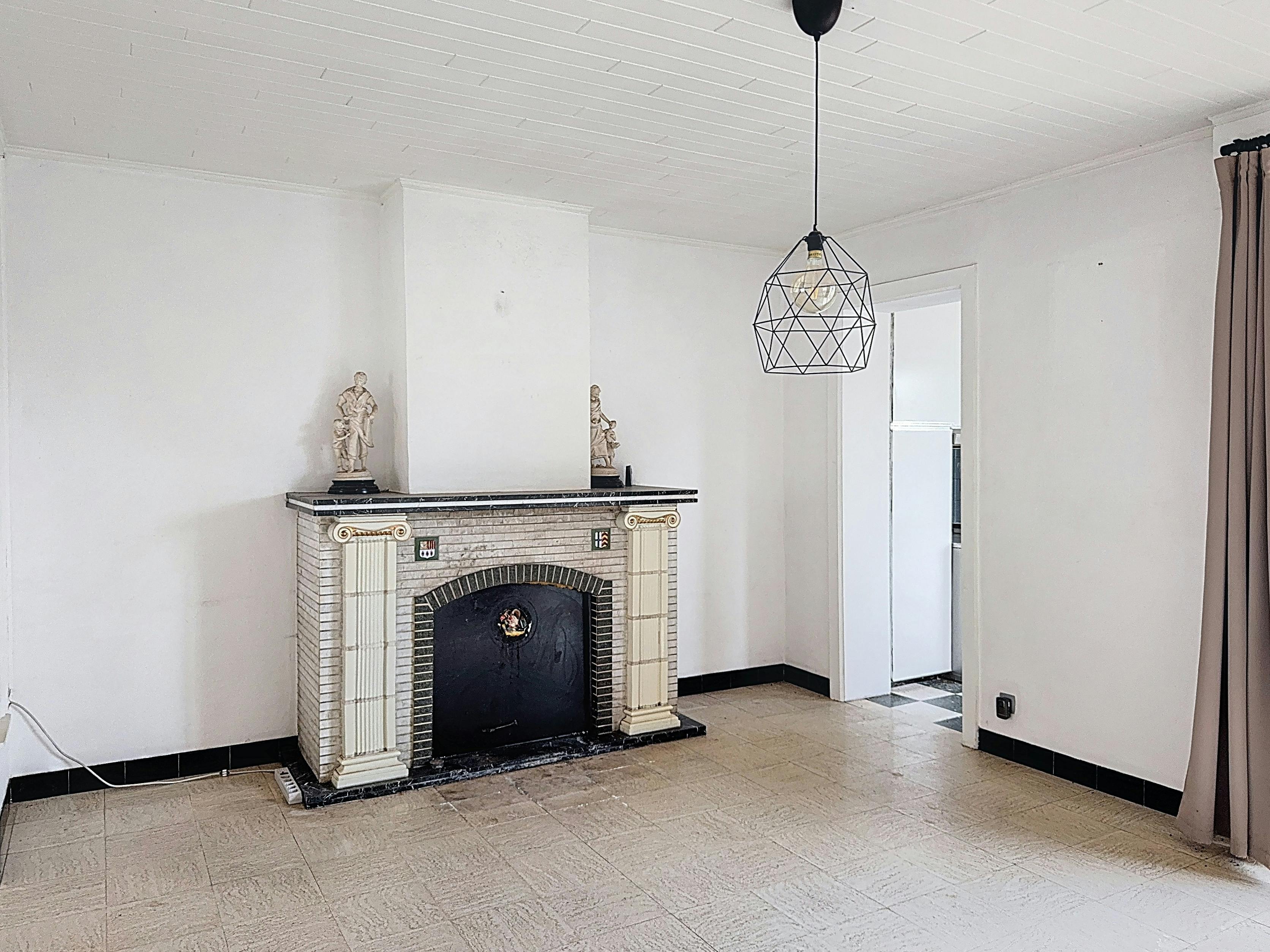 Te renoveren huis te koop in centrum Wielsbeke foto 4