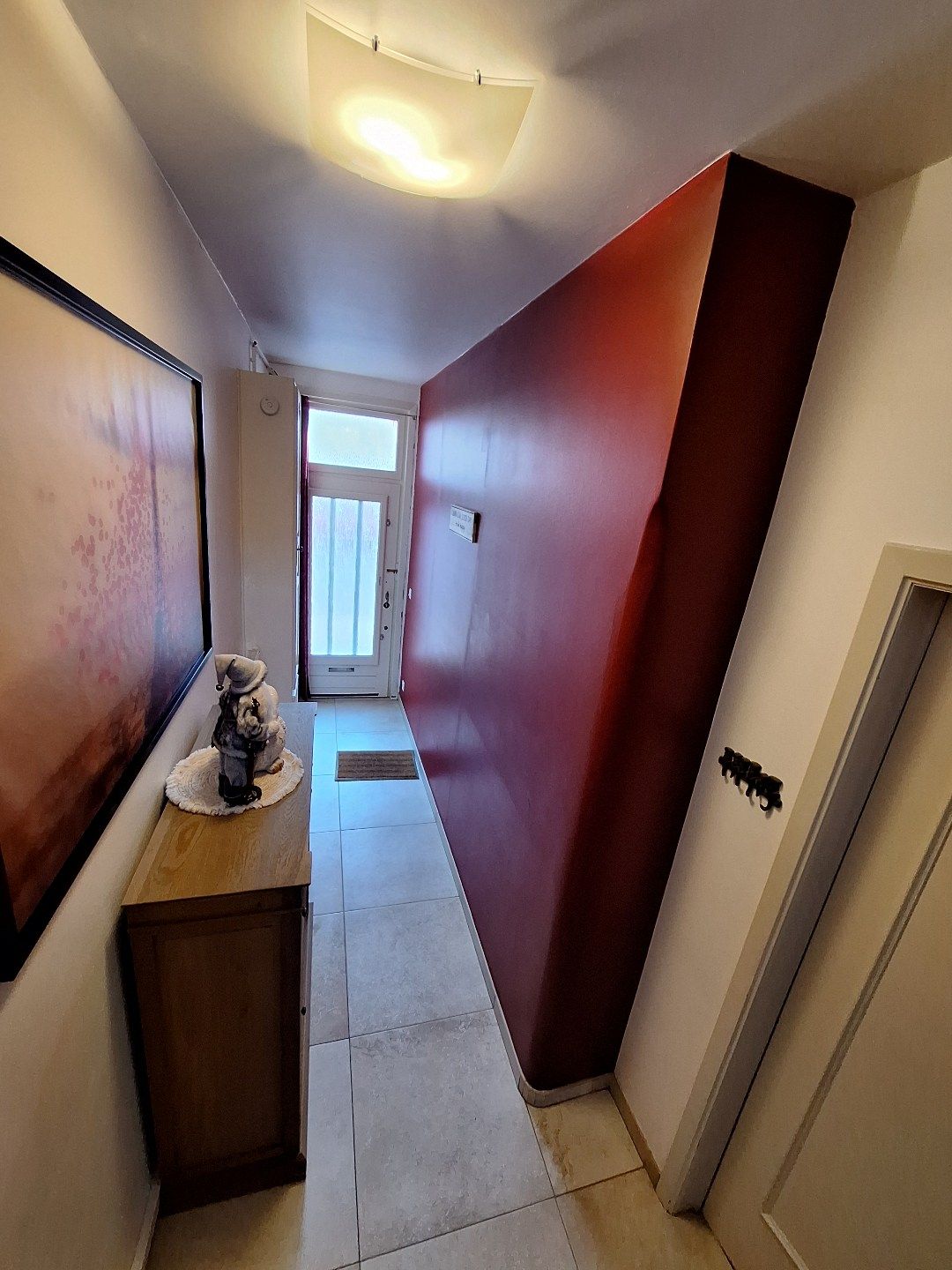 Gerenoveerde instapklare woning met terras en tuin foto 11