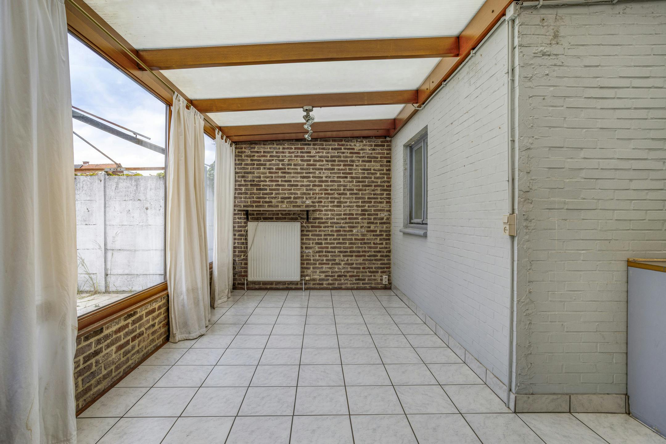 Te renoveren huis met vier slaapkamers en tuin in het centrum foto 18