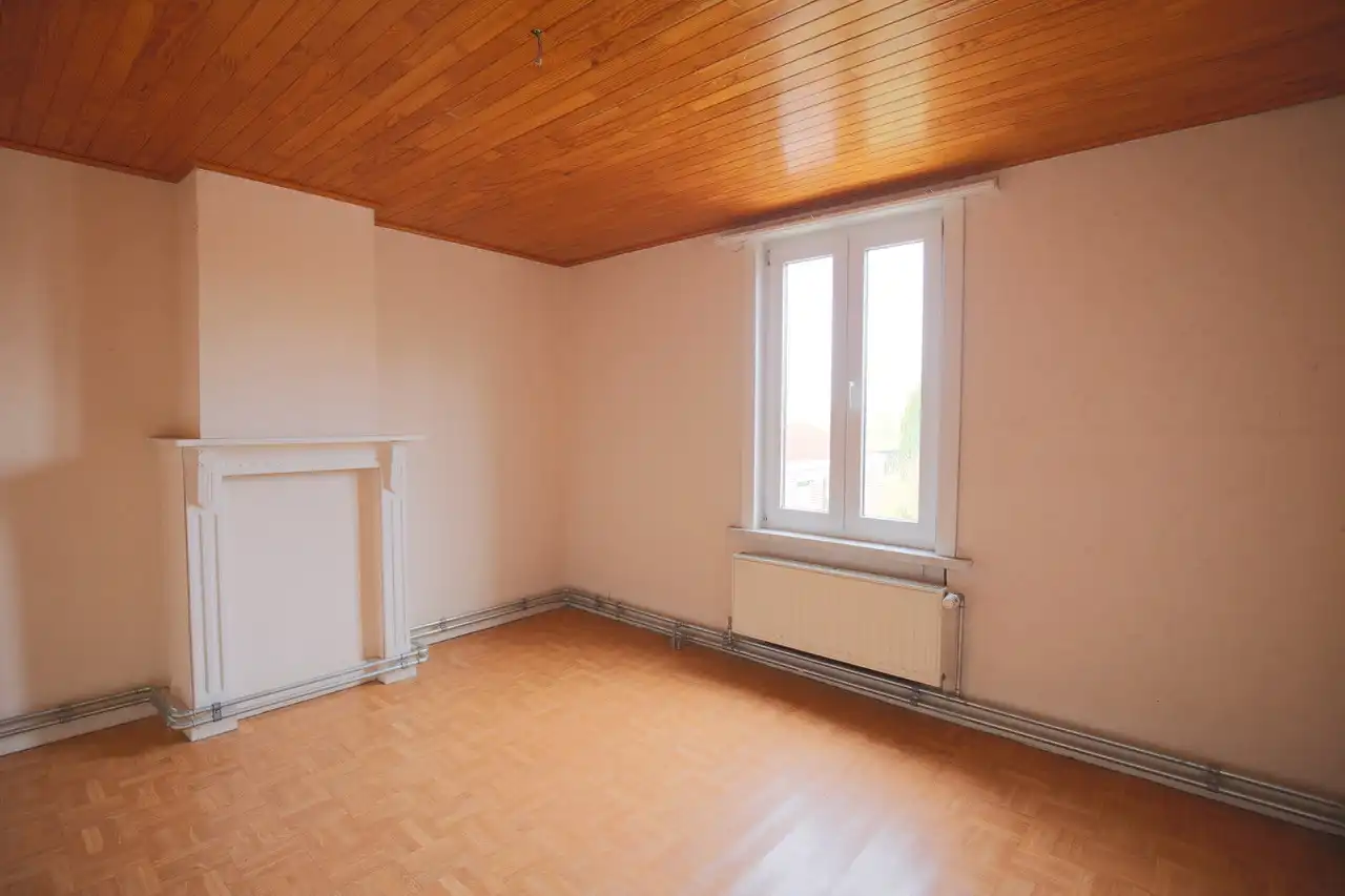 Rijwoning met terras en tuin foto 17