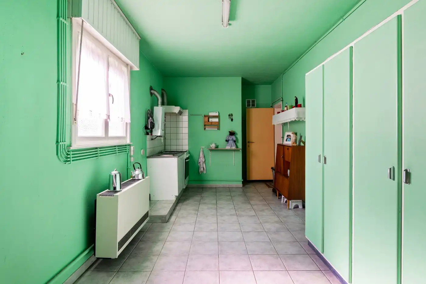 Vrijstaande, te renoveren woning met 3 à 4 slpk., garage en zuid-tuin foto 28