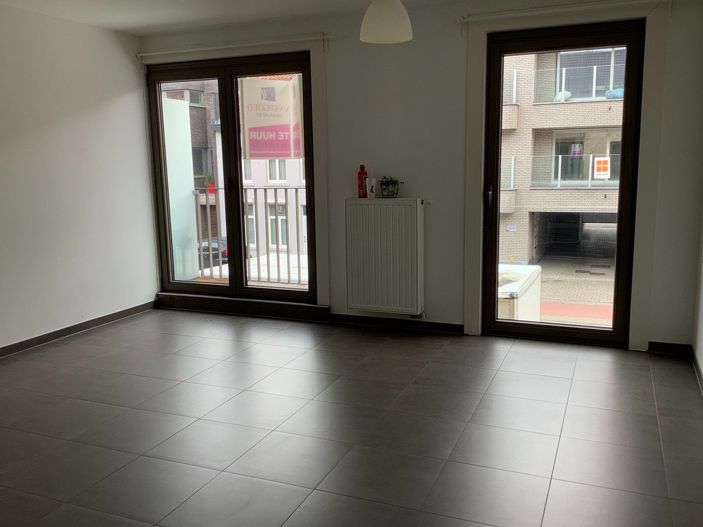 Mooi appartement in centrum Eeklo met 1 slpk en terras foto {{pictureIndex}}