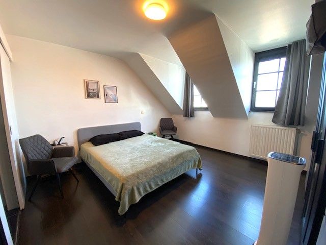 RUIM (131m²) INSTAPKLAAR  APPARTEMENT MET 2 SLAAPKAMERS, TERRAS, ONDERGRONDSE AUTOSTAANPLAATS EN KELDER foto 10
