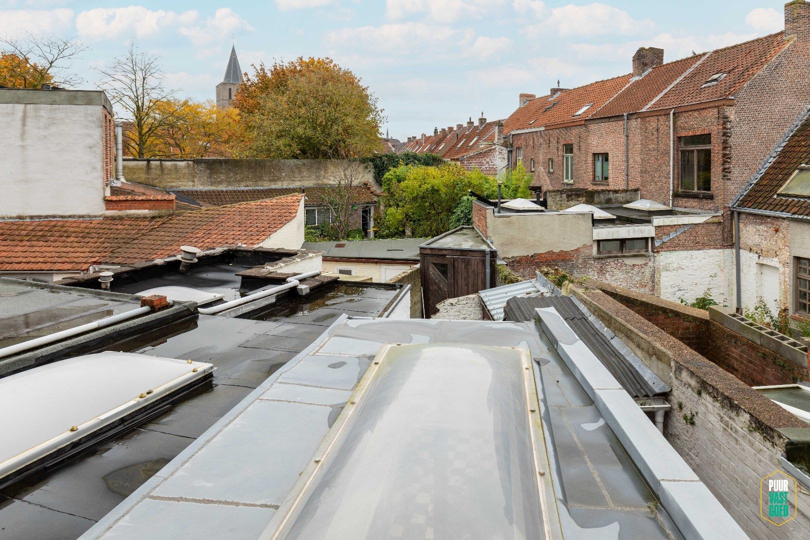 Te vernieuwen woning met zonnig stadsterras in super hartje Brugge. foto 14