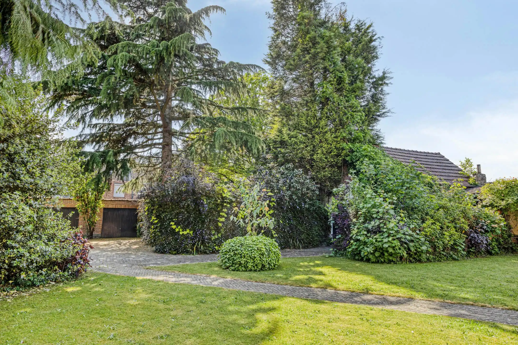 Deels te renoveren villa of tweewoonst met parktuin in Boom foto 33