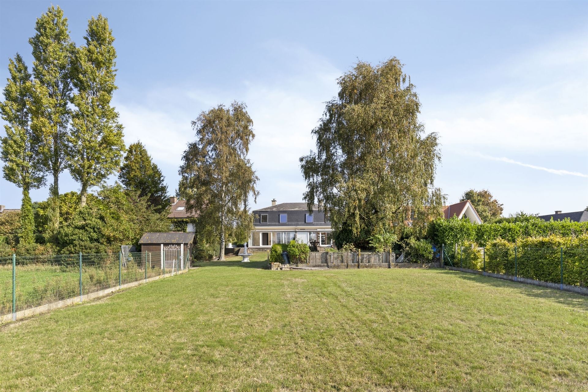 Woning met grote tuin, 3 slpks., veel licht en grote garage. foto 25