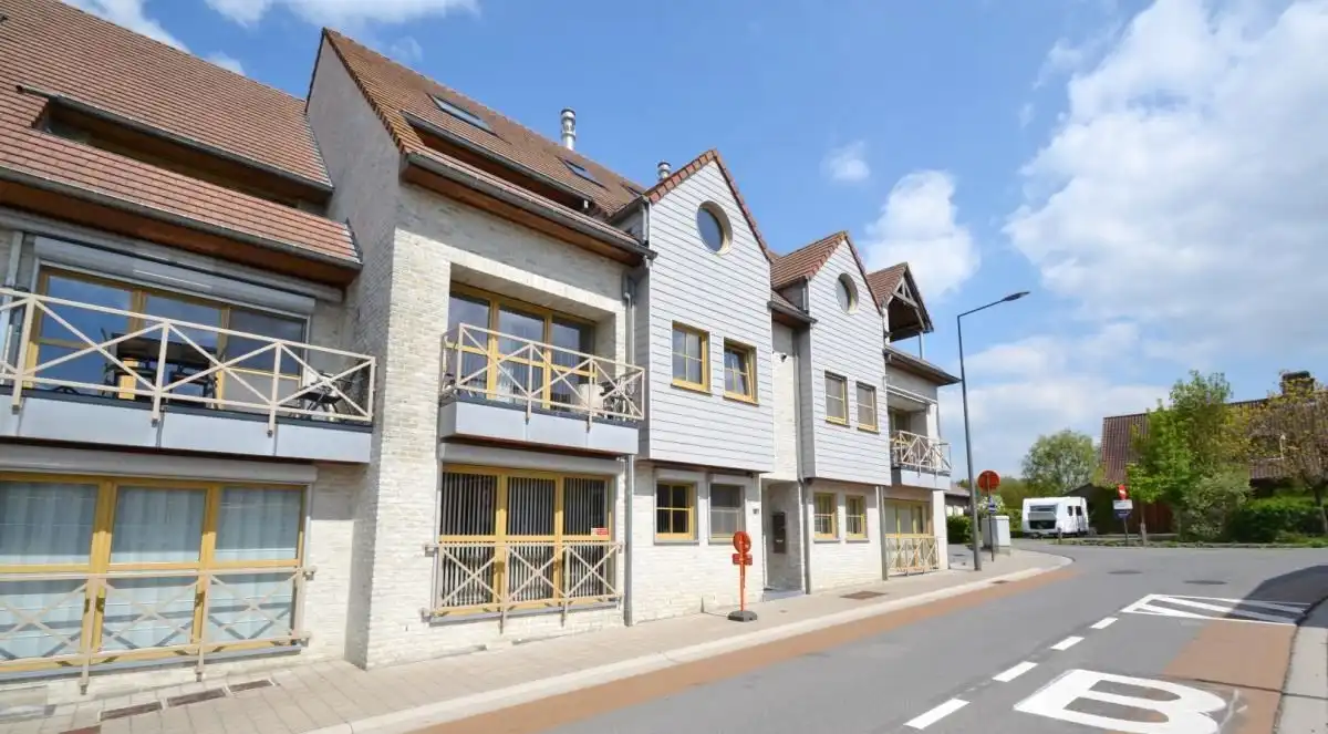 RUIM DUPLEX APP.135 m² MET TERRAS + VERPLICHT AAN TE KOPEN ONDERGRONDSE GARAGEBOX foto {{pictureIndex}}