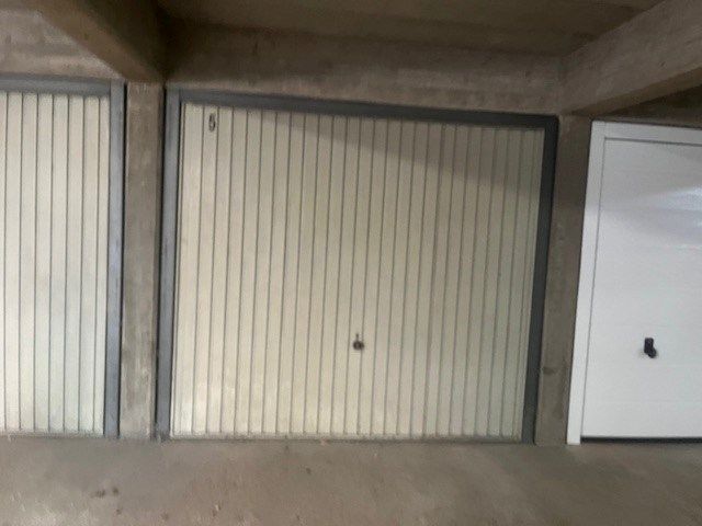 Toffe woning in rij met ingerichte tuin en garagebox foto 18