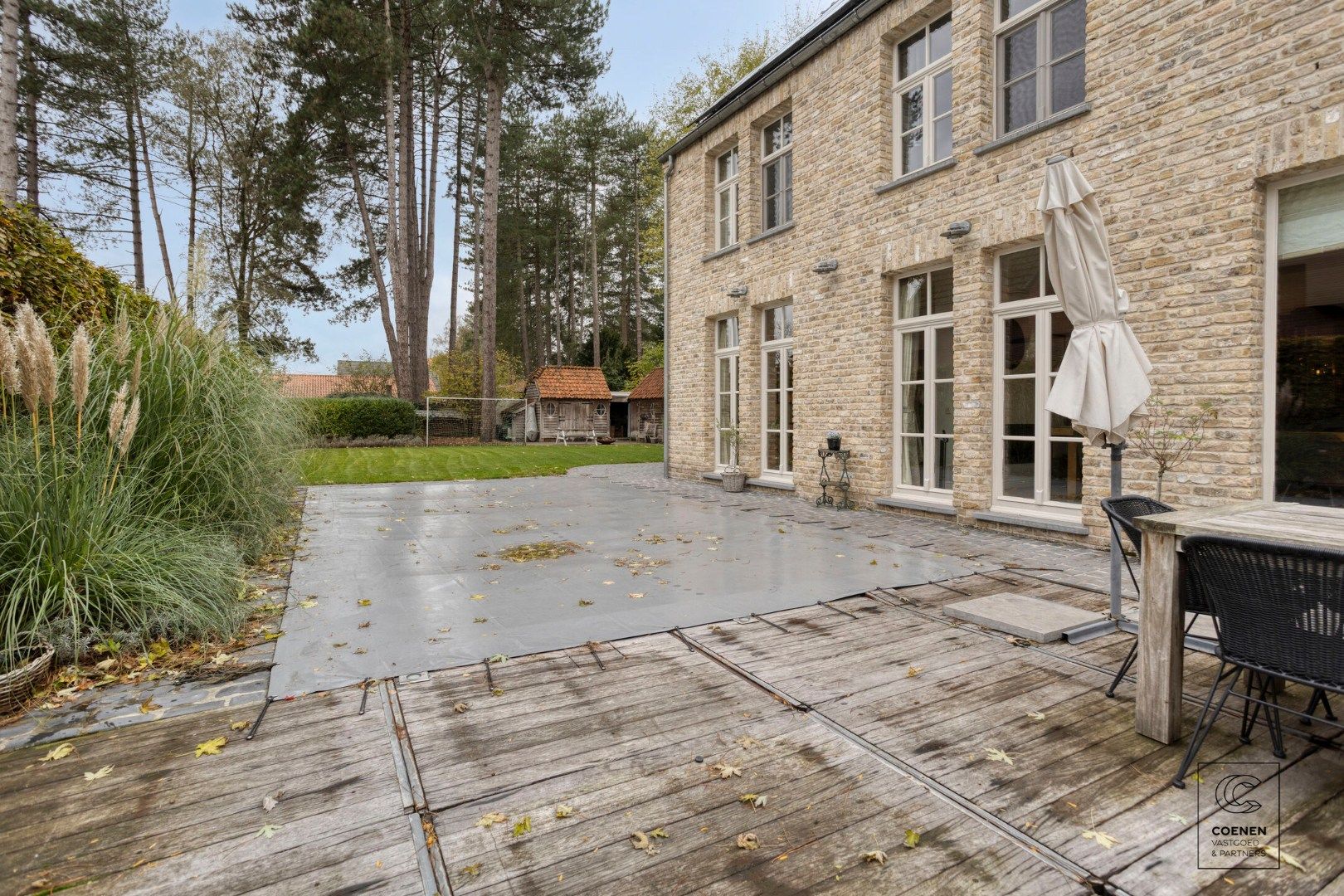 Prachtige woning met een bew. opp. van 302 m², 6 slpk, 3 bk en prachtige tuin met zwembad  foto 34