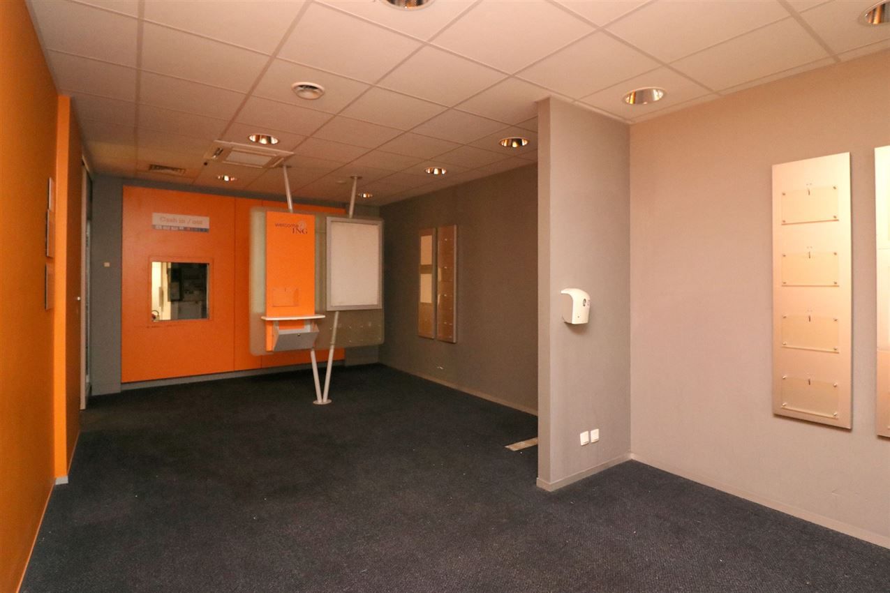 Opbrengsteigendom (handel & 4 app) op toplocatie foto 4