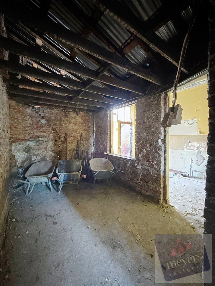 Te renoveren woning met goedgekeurde plannen in hartje Hasselt foto 8