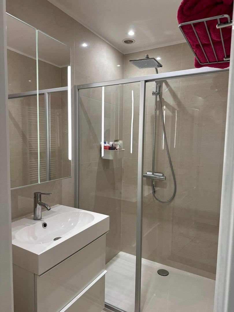 Uniek 4-slaapkamer appartement aan het Kerkplein foto 12