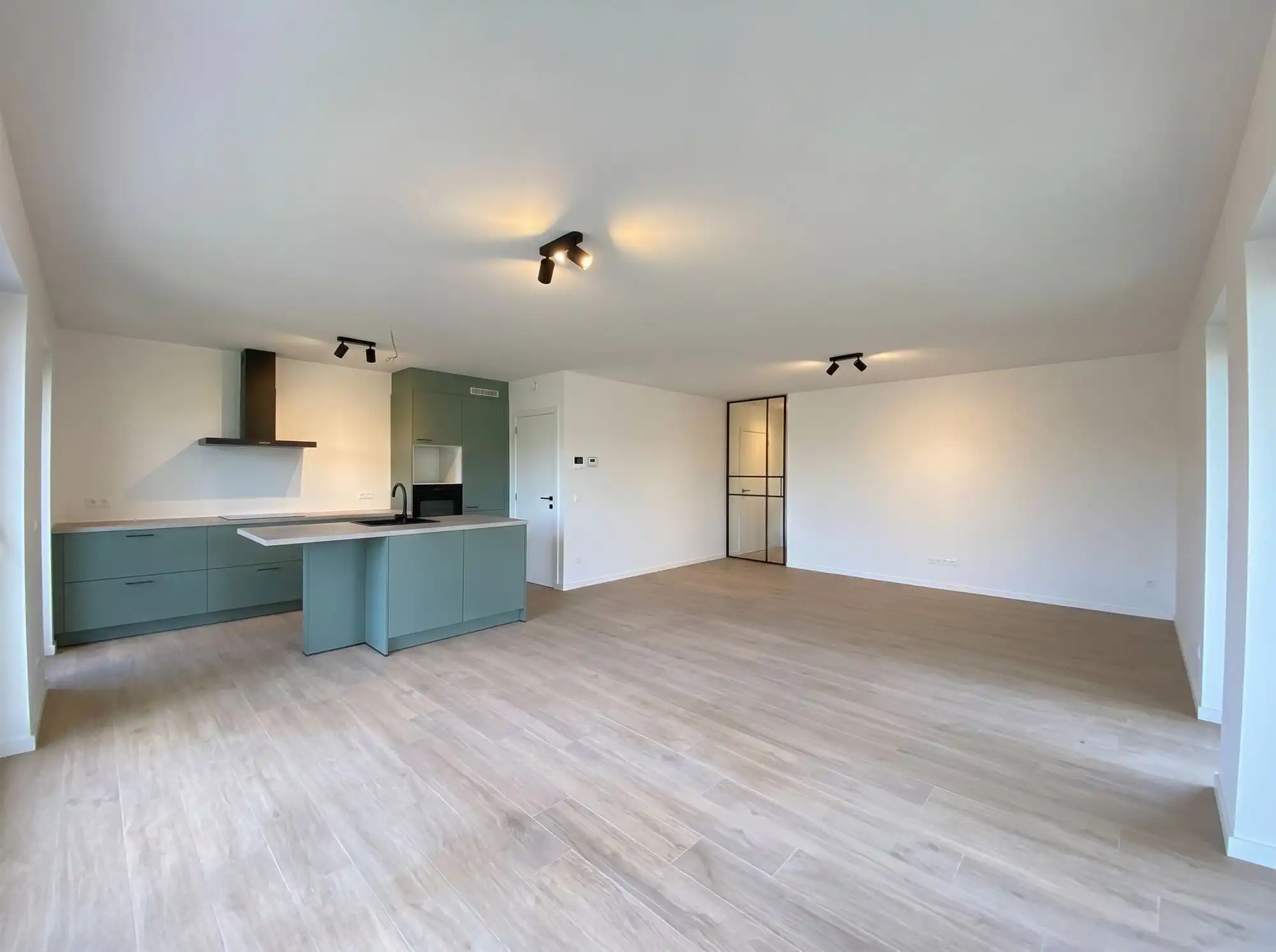 Gelijkvloers nieuwbouwappartement met garage en berging foto 3