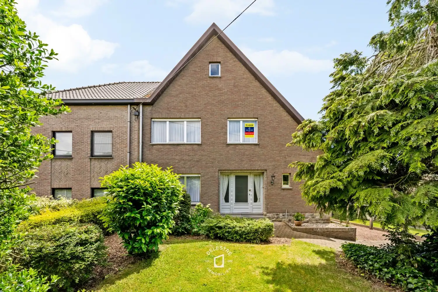 Ruimte, rust en potentieel: solide gezinswoning met volledige onderkeldering op 1.156 m² foto 2