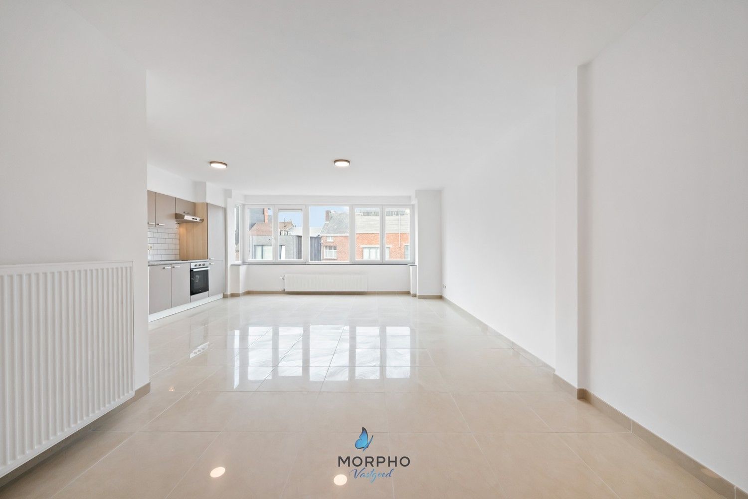 Modern en energiezuinig 2-slaapkamerappartement op de derde verdieping in hartje Temse! foto {{pictureIndex}}