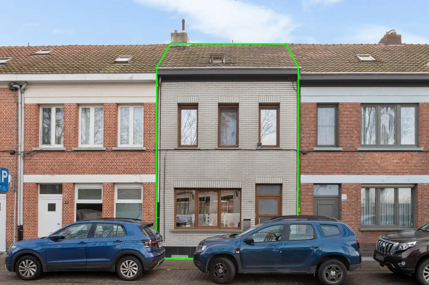 Huis met 3 à 4 slaapkamers en tuin te koop in Merksem foto {{pictureIndex}}