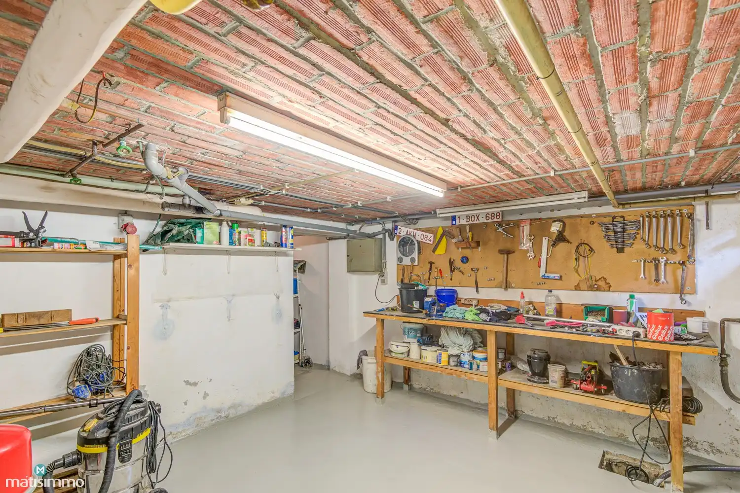KARAKTERVOLLE EENGEZINSWONING MET 5 SLAAPKAMERS, GARAGE, CARPORT EN TUIN NABIJ HET CENTRUM VAN BILZEN foto 31