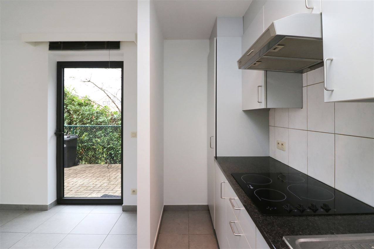 Gelijkvloers app met 1 slpk, terras, nabij station foto 6