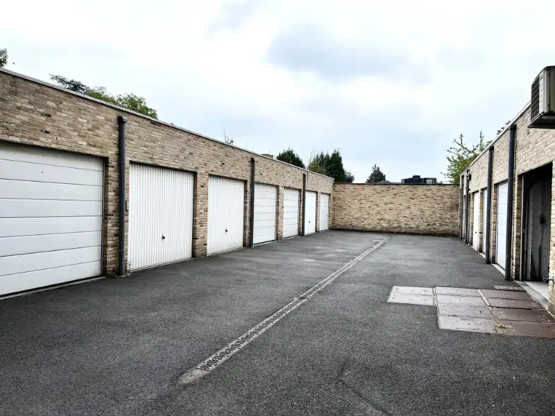 Centrum gelegen app. met 2 slpkms en garage foto 18