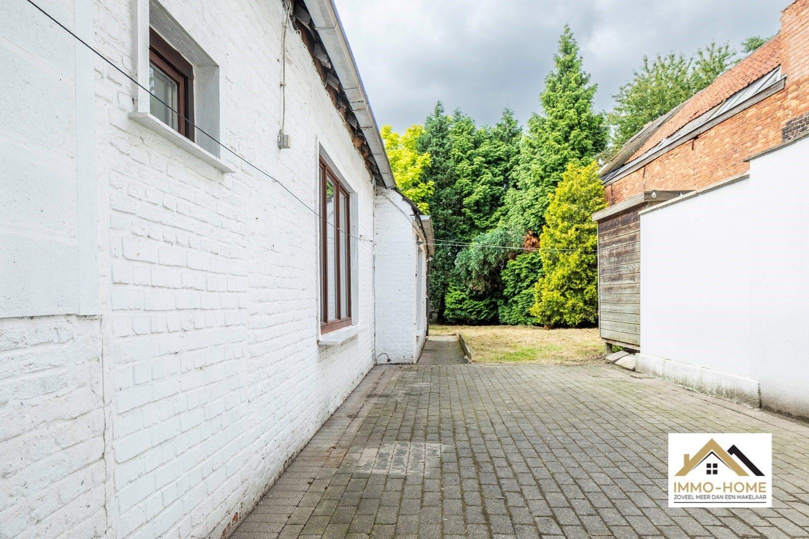 Opgefriste rijwoning met ruime tuin te Destelbergen foto 8