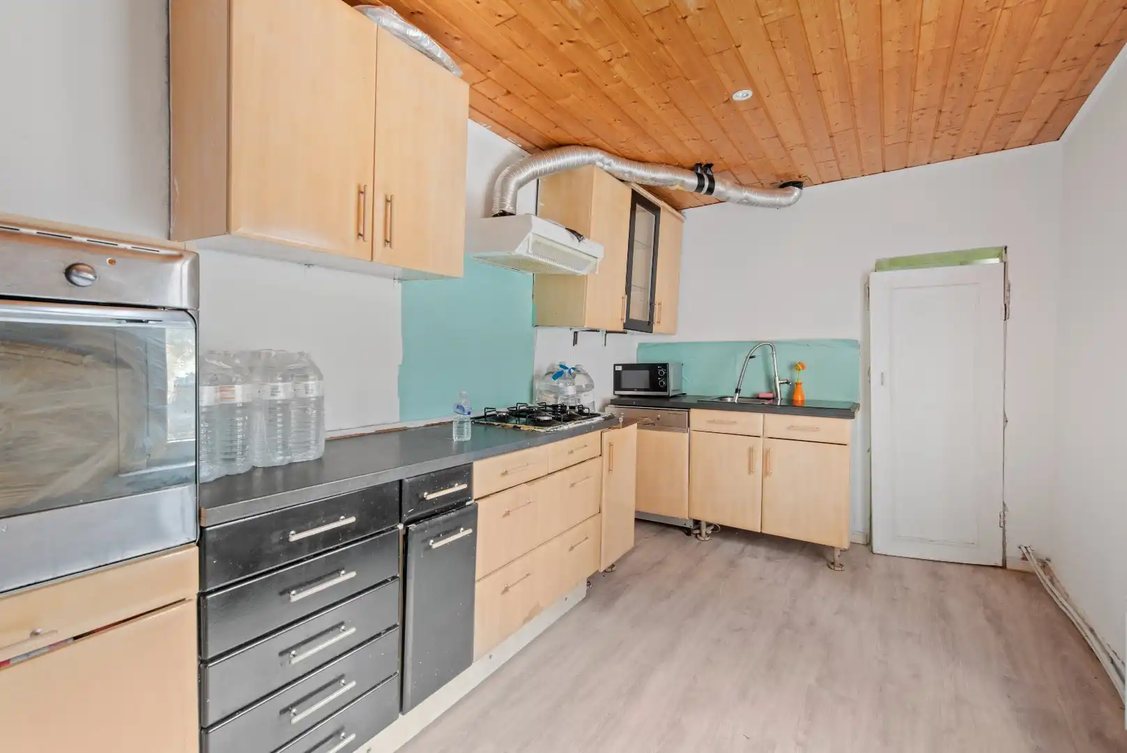 Polyvalente rijwoning met grote handelsruimte te Tienen foto 14