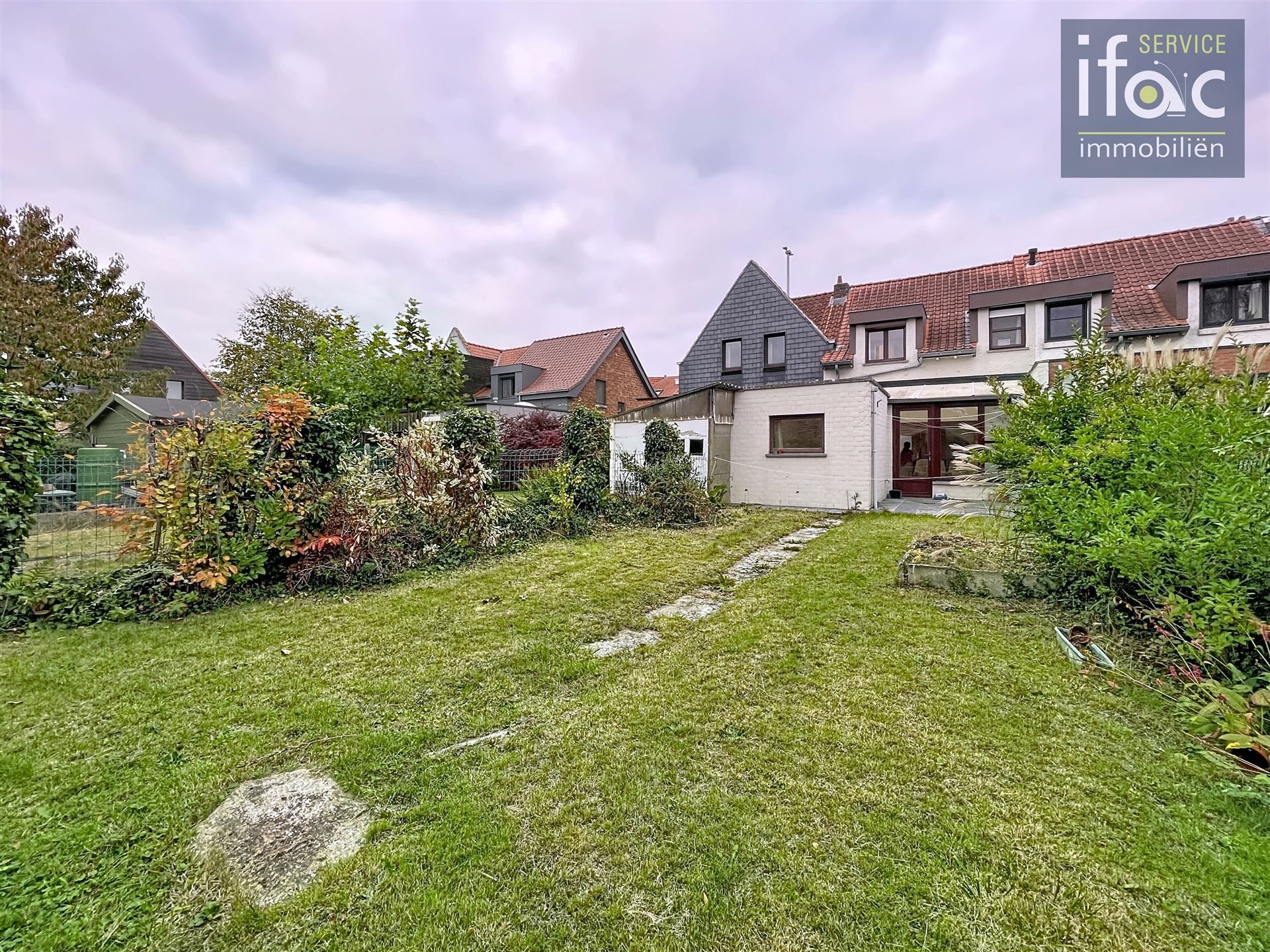 Rijwoning met tuin  foto 21