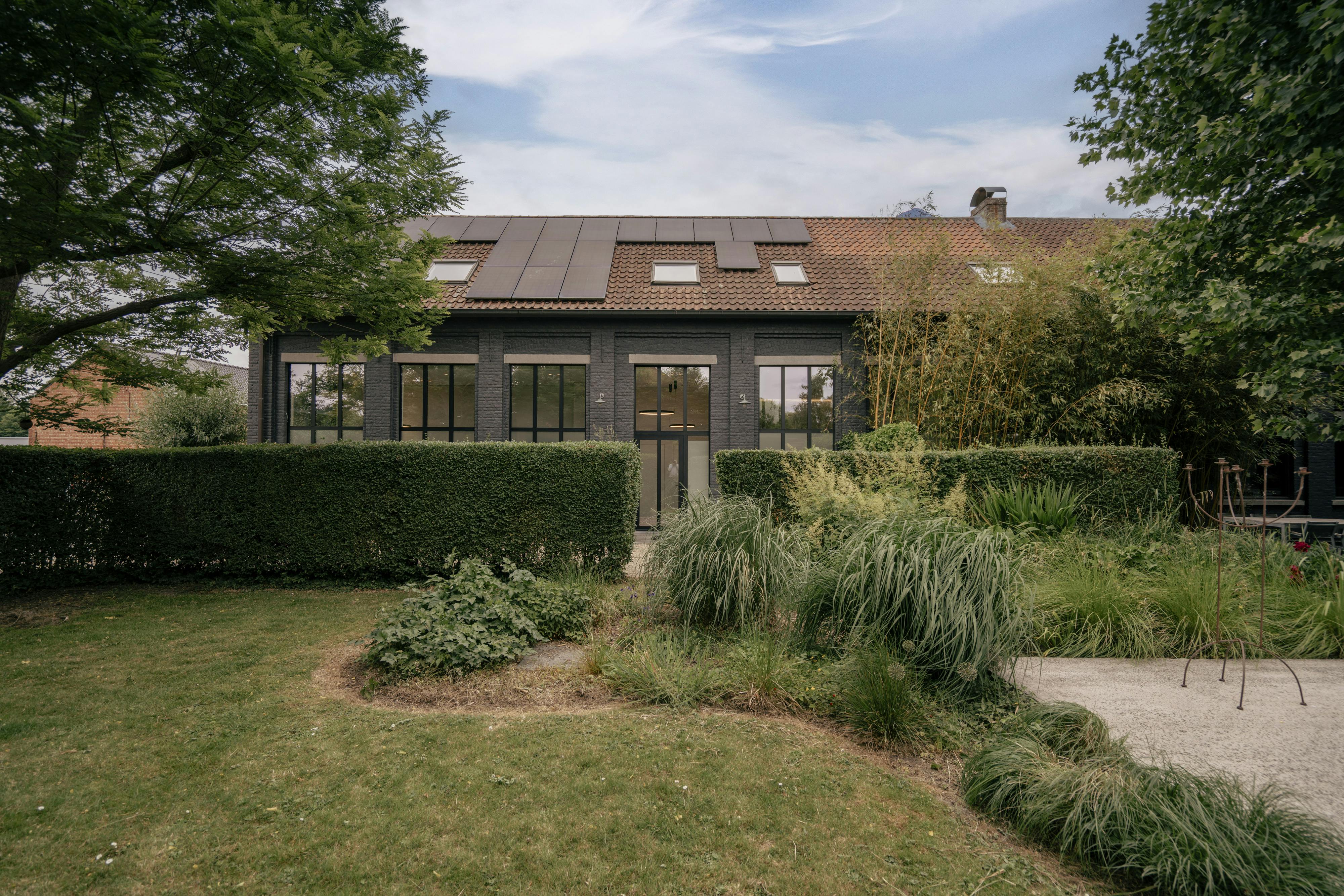 Exclusieve karaktervilla met praktijkruimte en loft in Wetteren foto 5