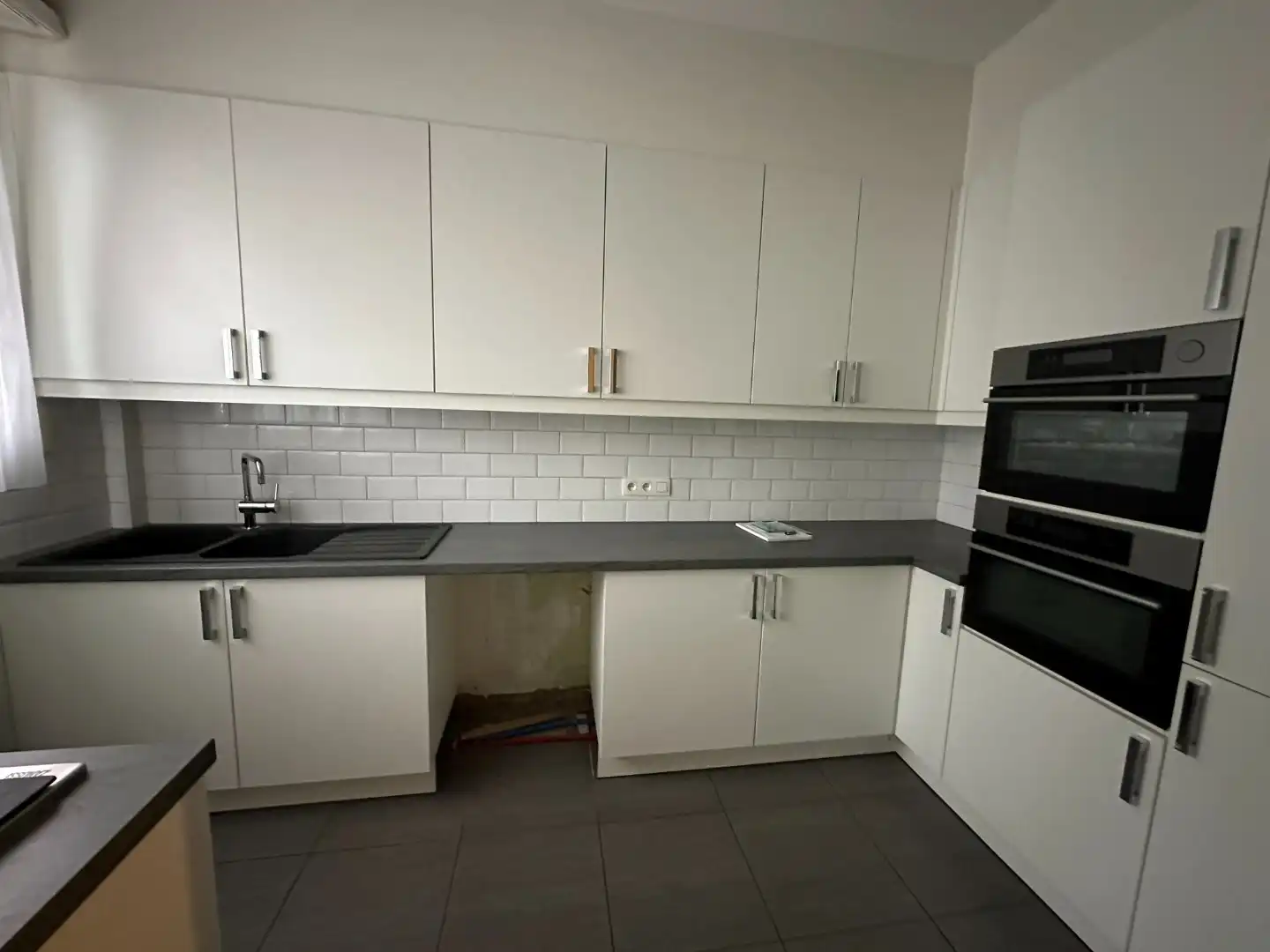 Gelijkvloersppartement met 3 slpk, dubbele garage, tuin en ruime kelder (120 m²) foto 4