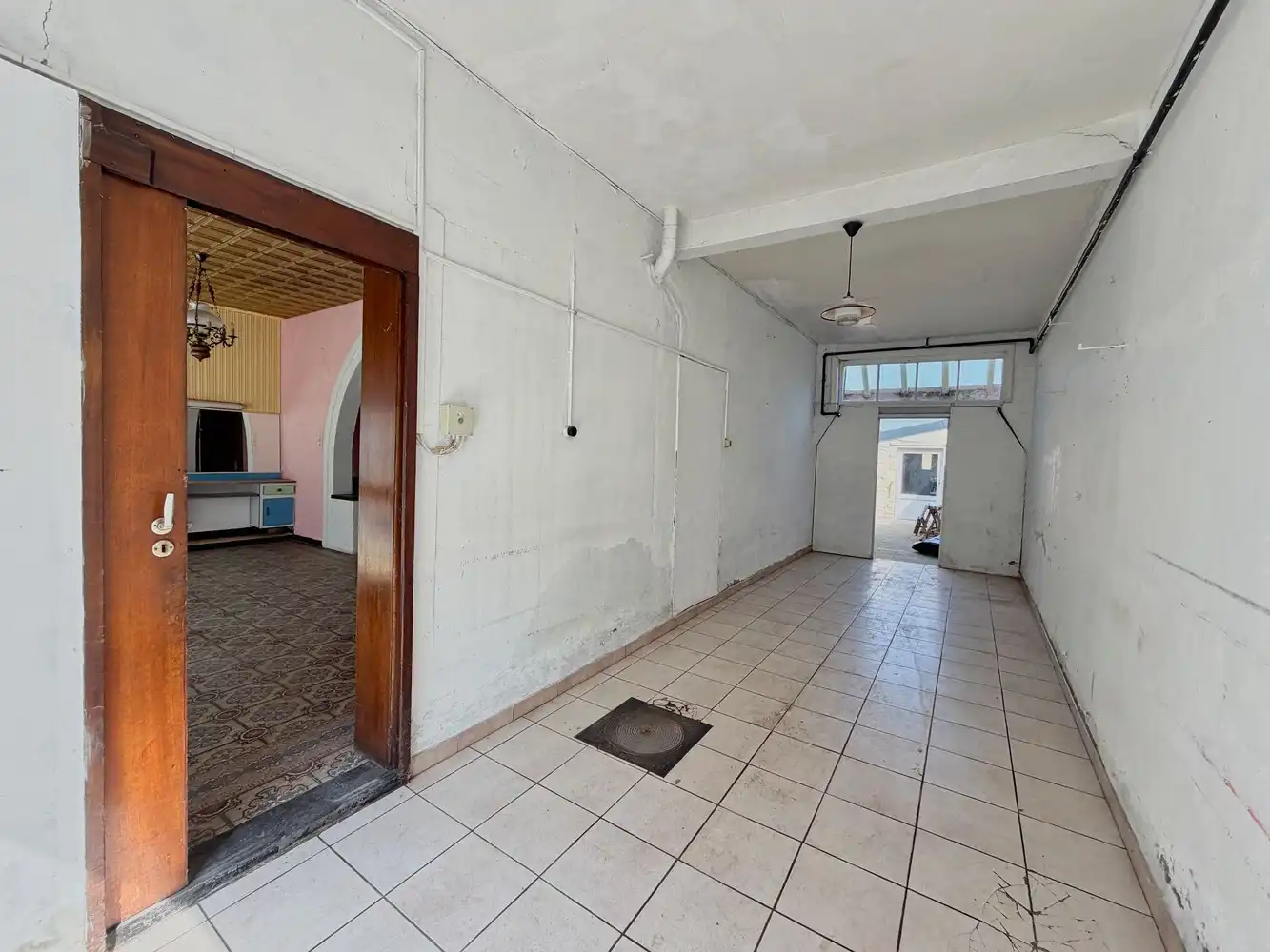 Ruime woning met polyvalente ruimte, zonnige tuin en tal van mogelijkheden foto 12