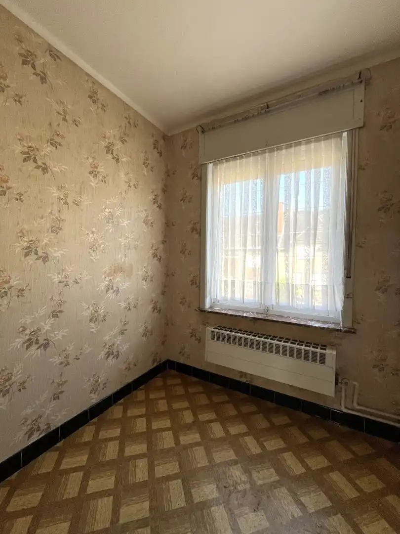 Moorslede – Halfopen woning met veel potentieel foto 14