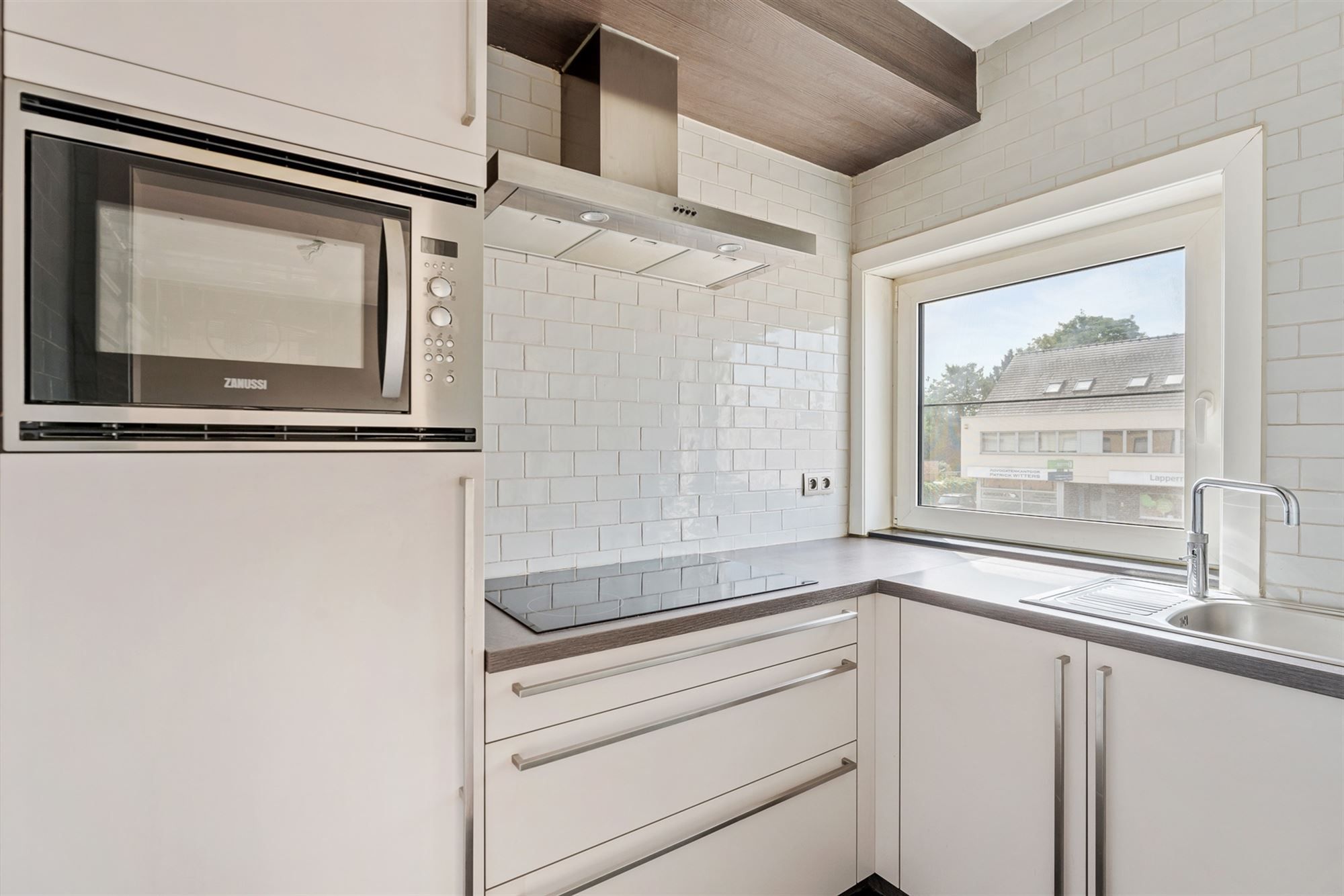 CENTRAAL GELEGEN EN INSTAPKLAAR APPARTEMENT MET 2 SLAAPKAMERS EN GARAGE NABIJ PAAL DORP foto 6