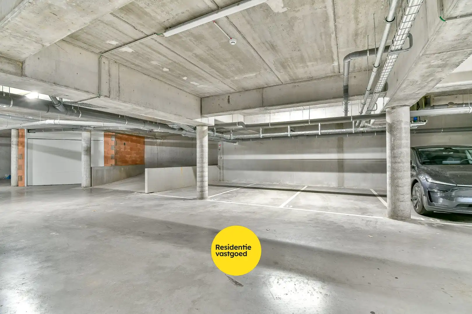 Ondergrondse parkeerplaatsen te koop in het centrum van Gistel foto 3