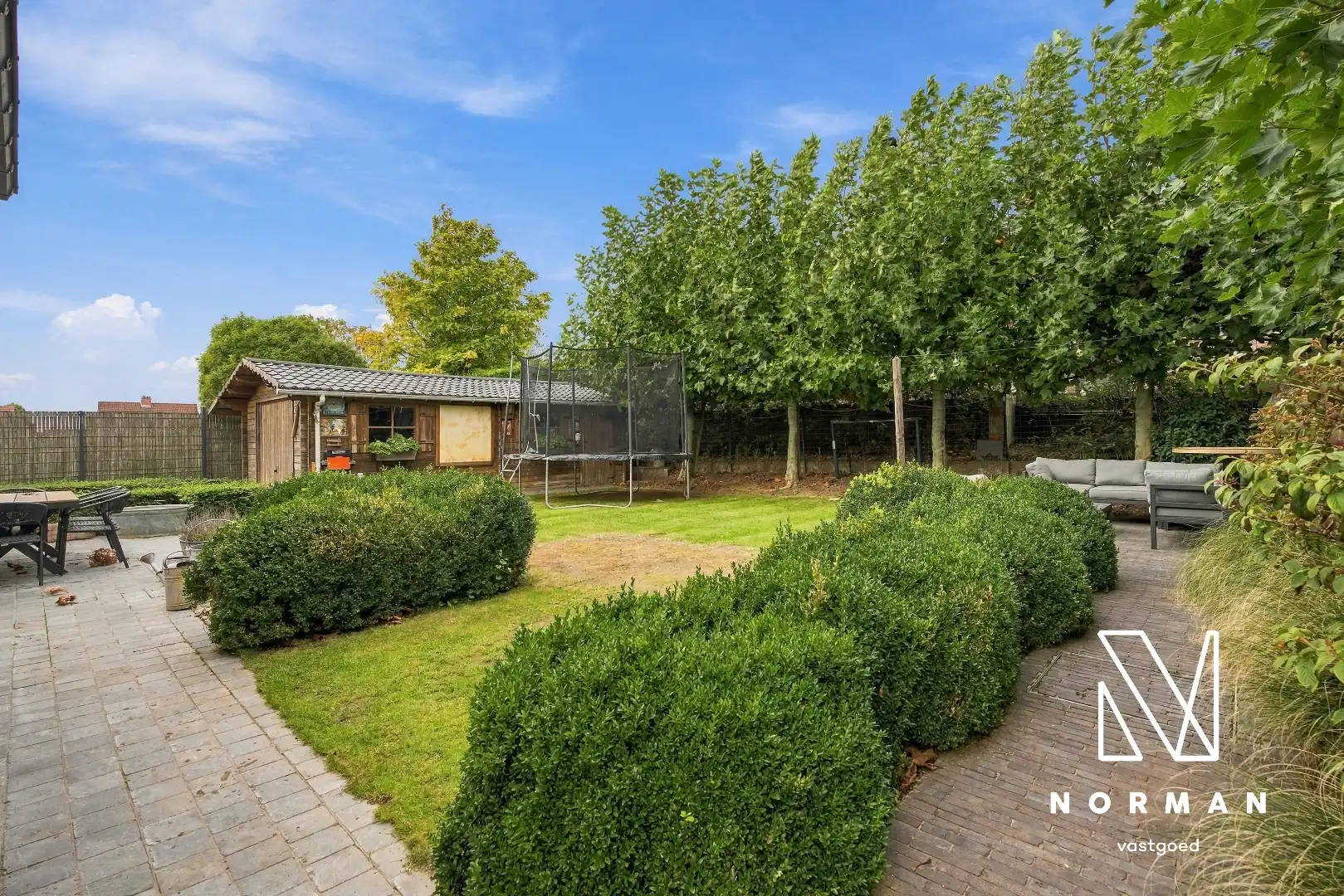 Hedendaagse villa met 4 slks, inpandige garage en mooie aangelegde tuin. foto 5