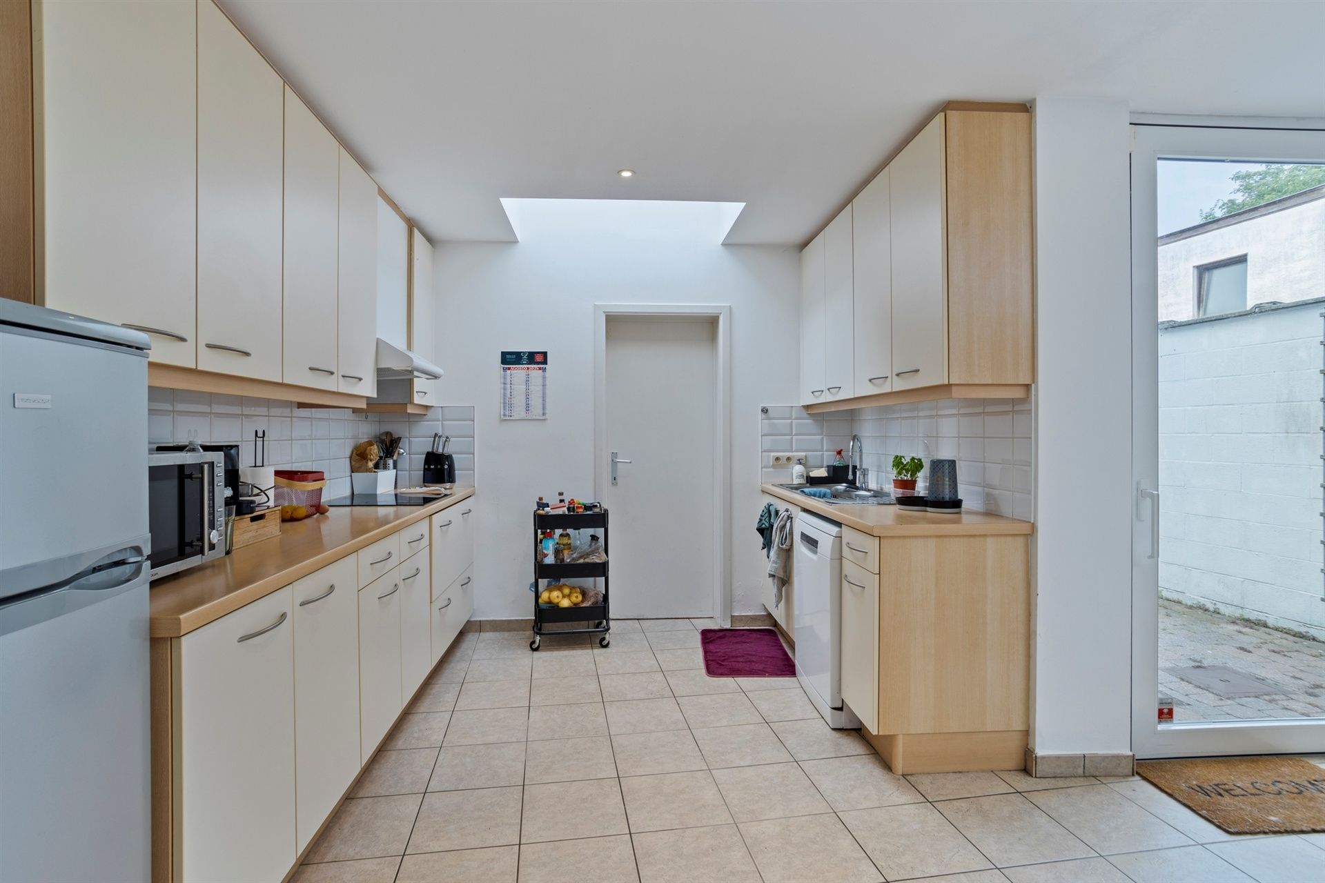 Instapklare rijwoning met stadskoer in hartje Merchtem foto 11