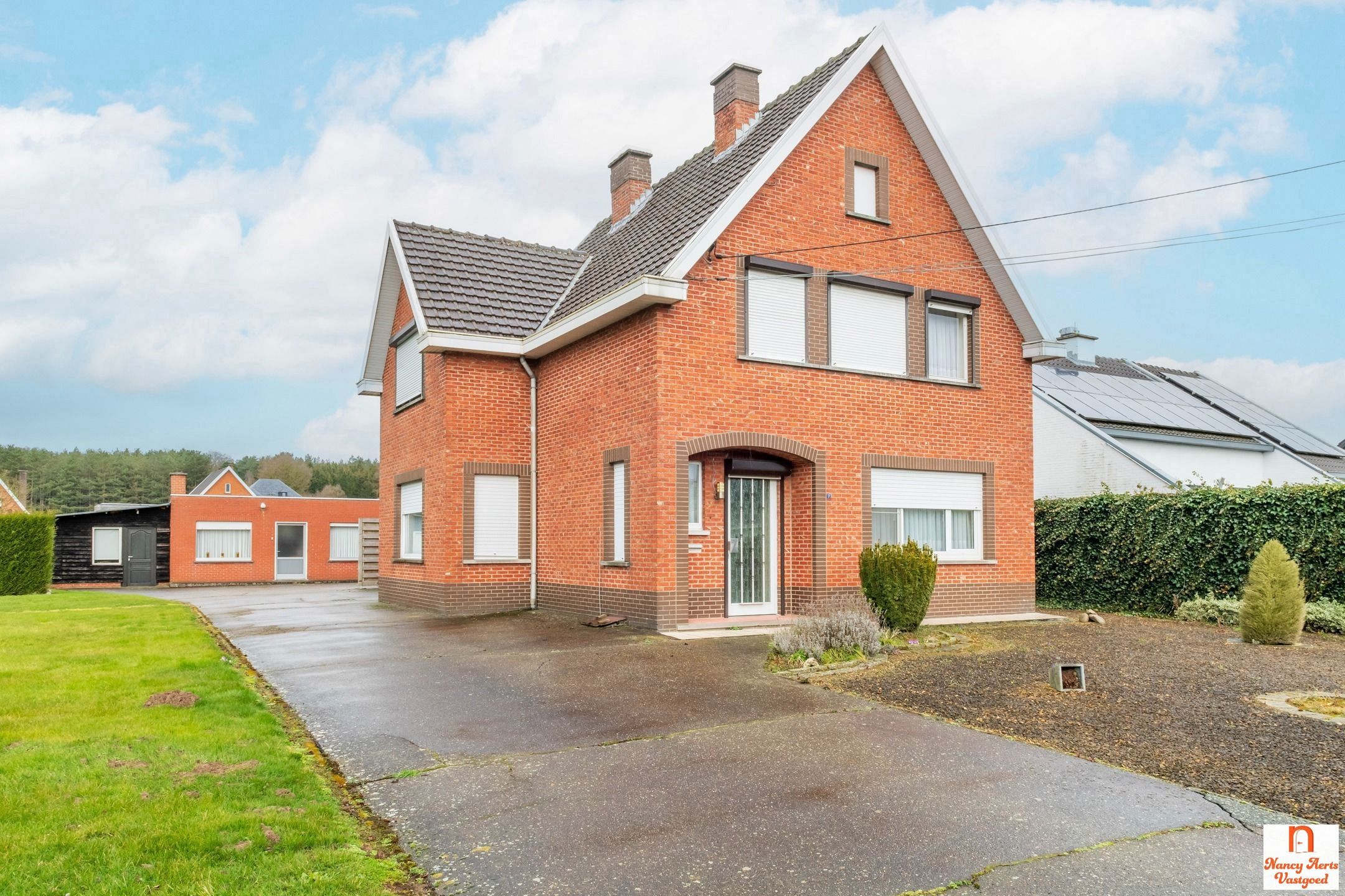 Hoofdfoto van de publicatie: Charmante woning met vergunde opbrengstwoning in Meldert