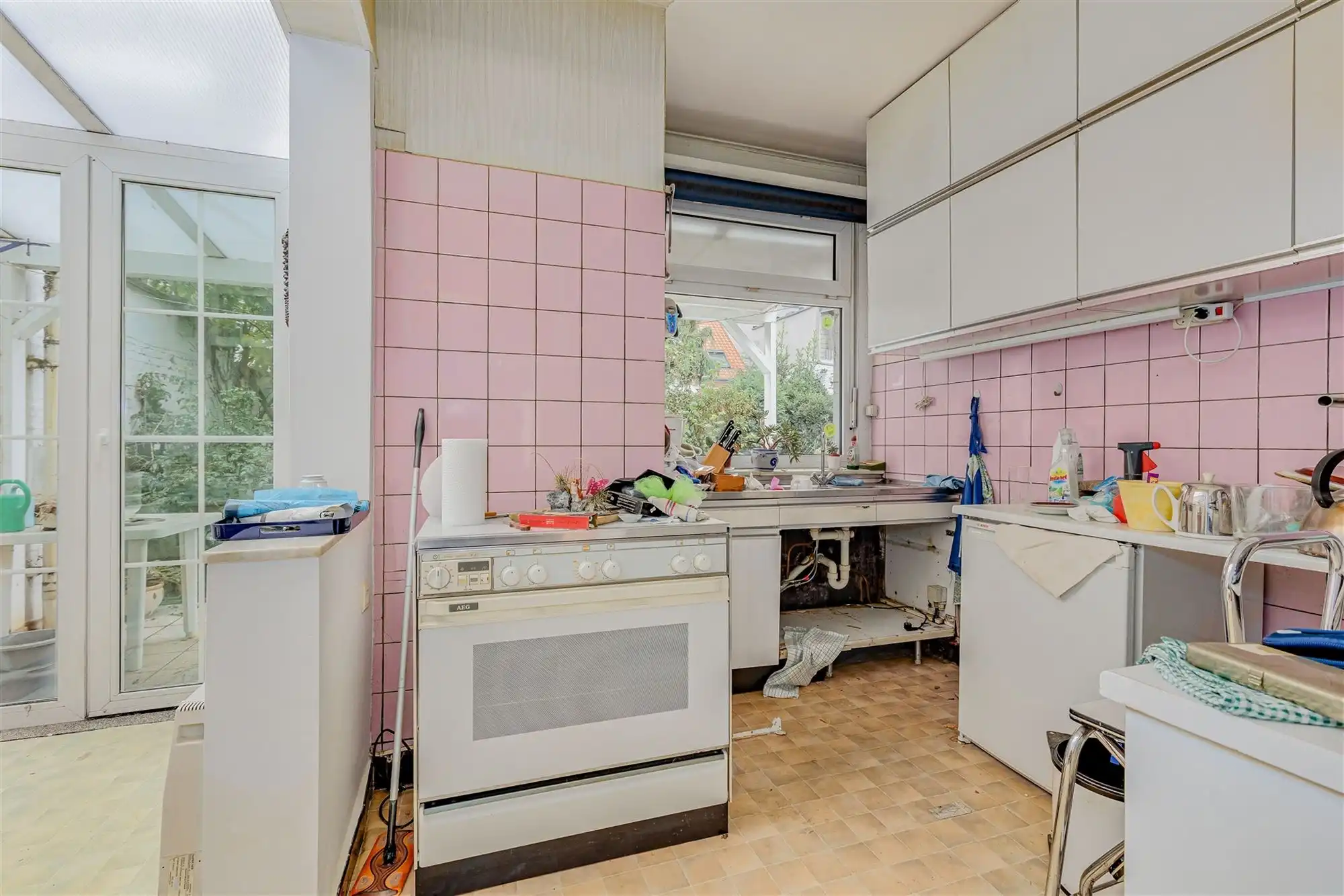 Te renoveren woning met tuin in Merksem foto 6